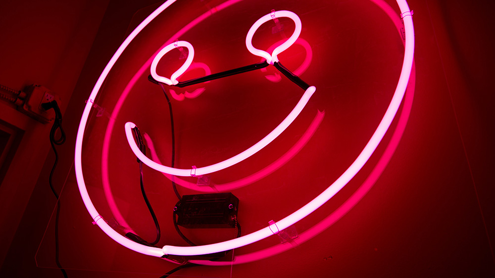 Leuchtreklame Smiley in rot